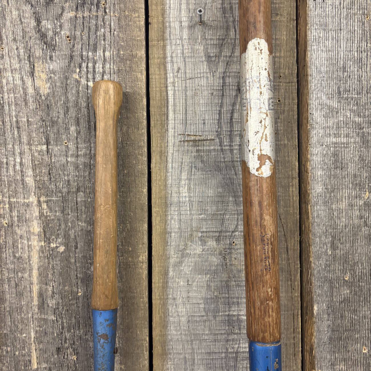 Two Antique Blue Grass Brand Agricultural Hand Tools