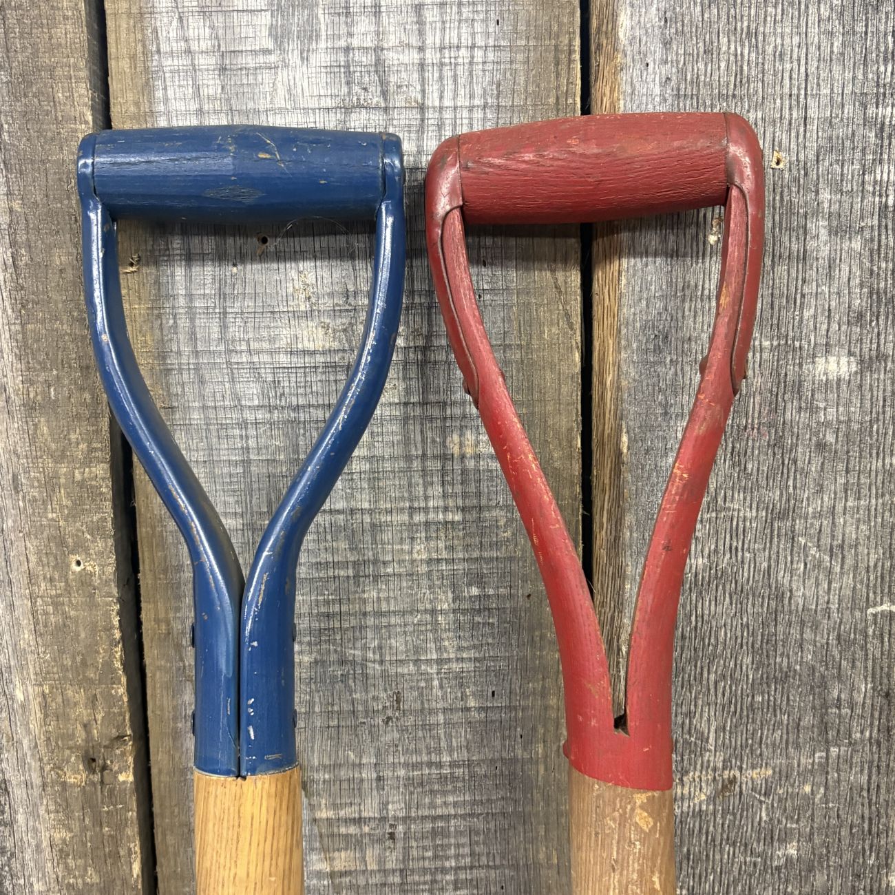 A Pair of Vintage Belknap Blue Grass and Shapleigh Blue Ribbon D-Handle Tool Shafts