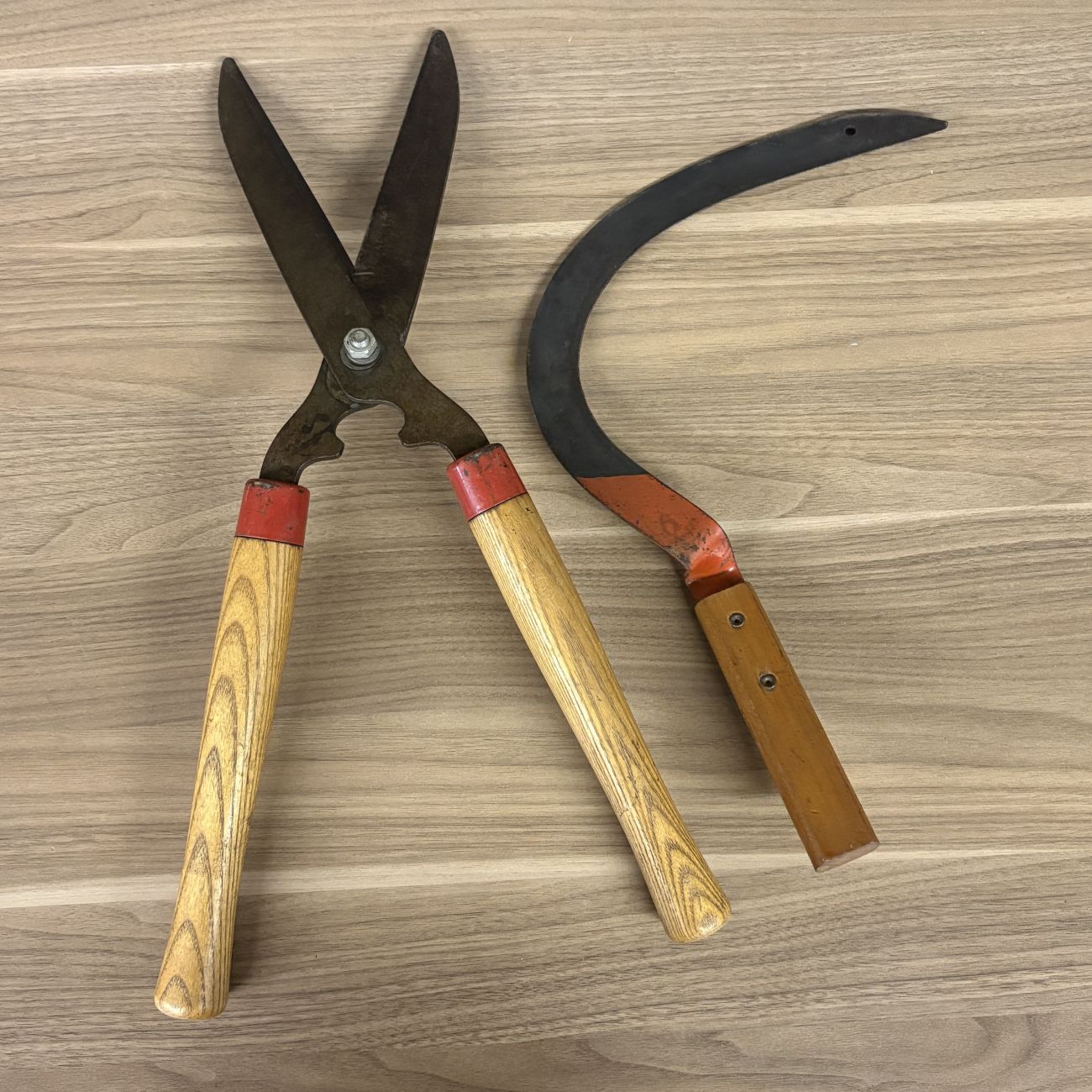 A Trio of Vintage Manual Garden Tools Including a Belknap Blue Grass Bow Saw