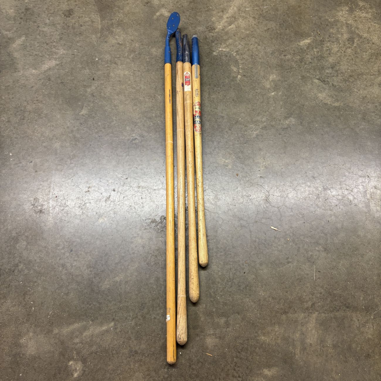 A Group of Belknap Blue Grass and Blue Ribbon Vintage Replacement Tool Handles