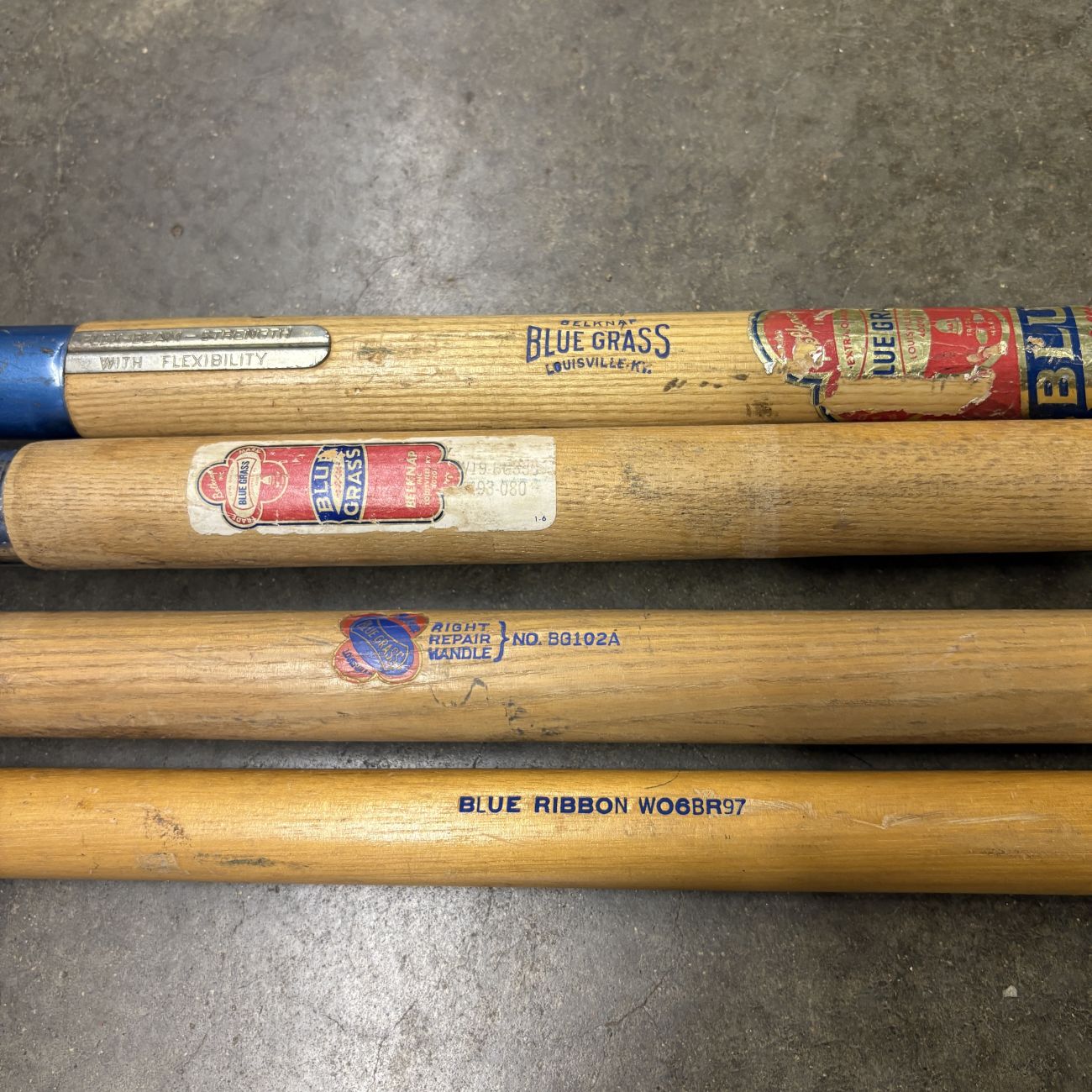 A Group of Belknap Blue Grass and Blue Ribbon Vintage Replacement Tool Handles