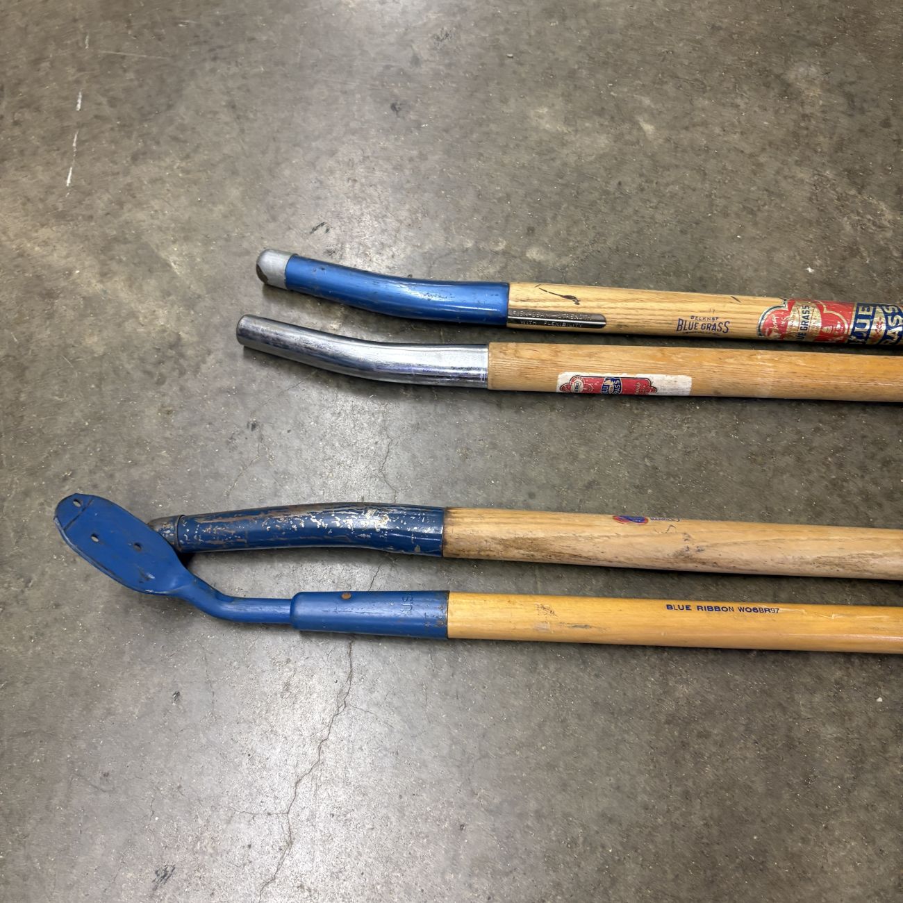A Group of Belknap Blue Grass and Blue Ribbon Vintage Replacement Tool Handles