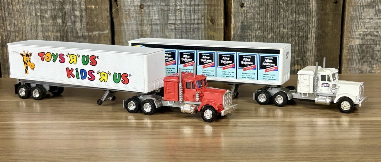 A Pair of Lionel Die-cast Semi-Tractor Trailers with Toys R Us and Alka-Seltzer Branding