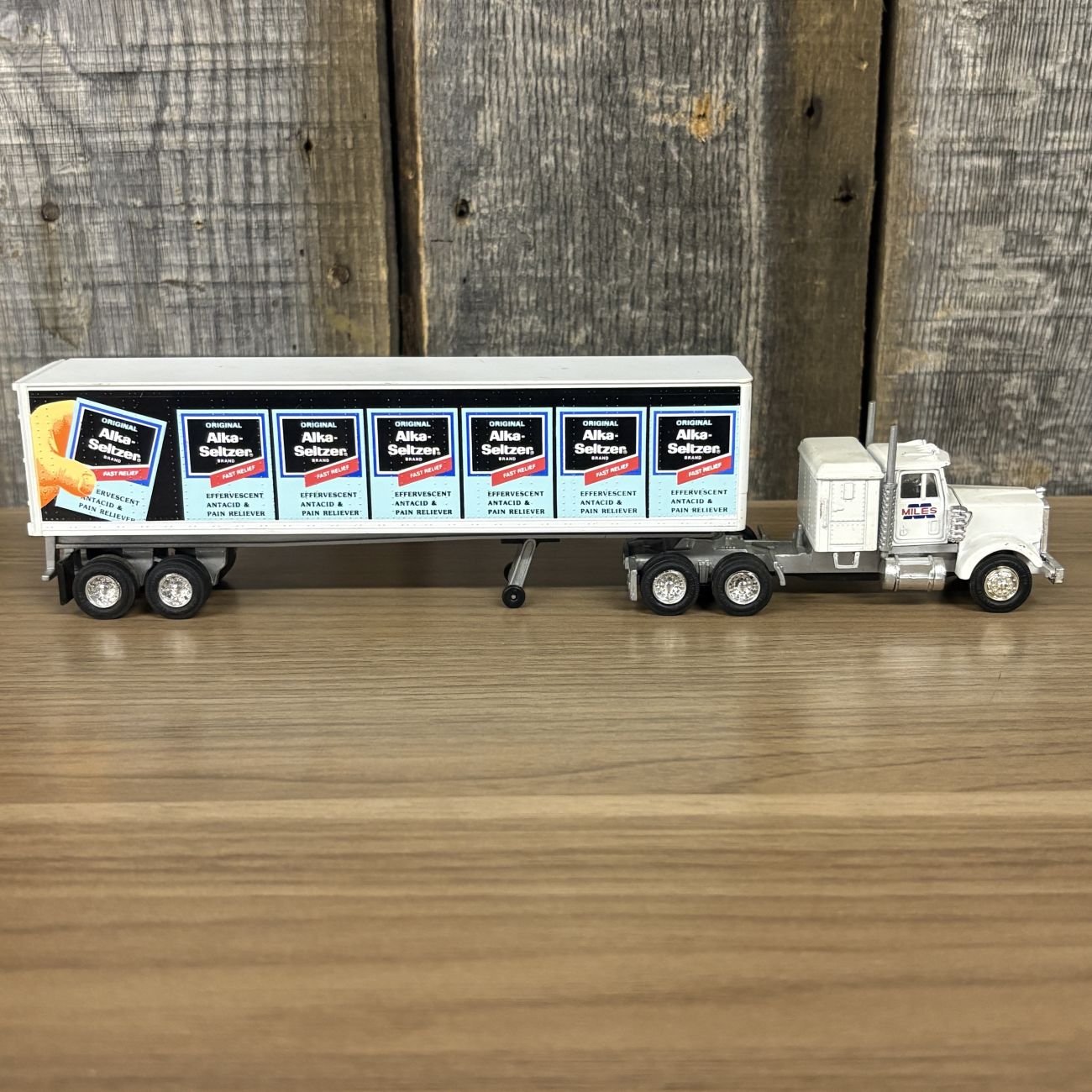 A Pair of Lionel Die-cast Semi-Tractor Trailers with Toys R Us and Alka-Seltzer Branding