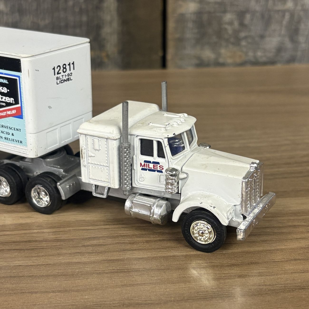 A Pair of Lionel Die-cast Semi-Tractor Trailers with Toys R Us and Alka-Seltzer Branding