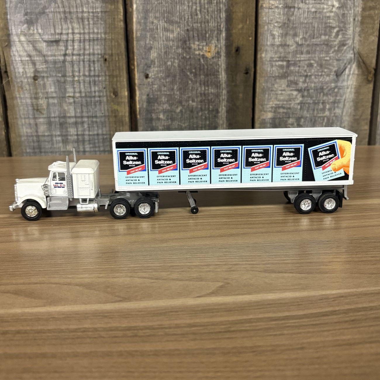 A Pair of Lionel Die-cast Semi-Tractor Trailers with Toys R Us and Alka-Seltzer Branding