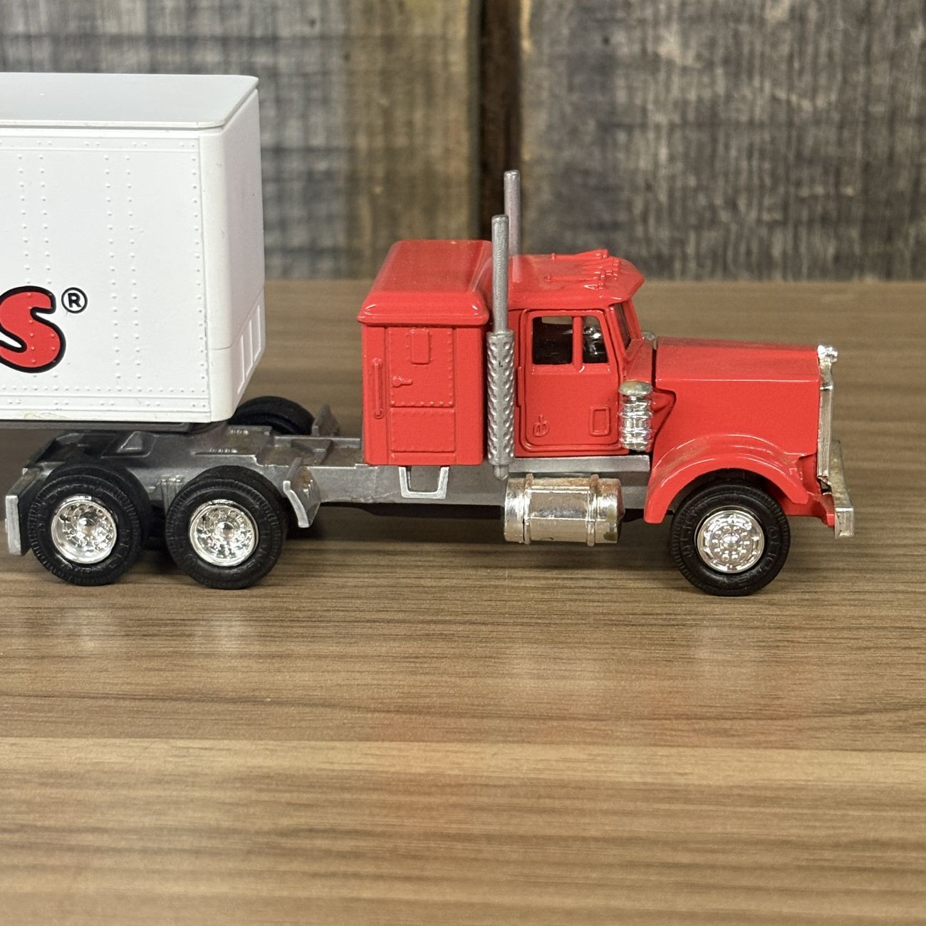 A Pair of Lionel Die-cast Semi-Tractor Trailers with Toys R Us and Alka-Seltzer Branding