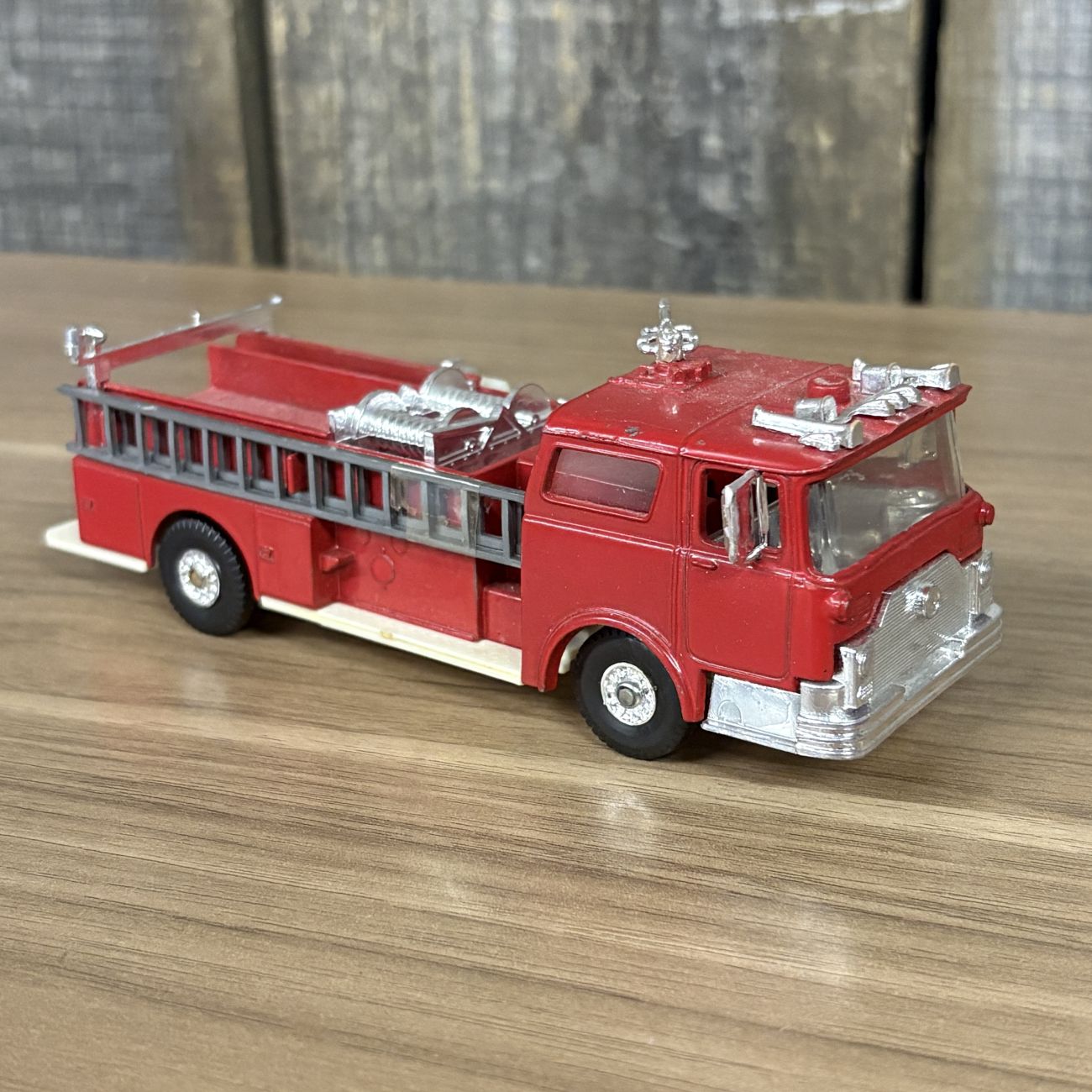 A Collection of Five Vintage Semi-Tractor Cabs and Fire Engine by Lionel, GATA, and Szetoy