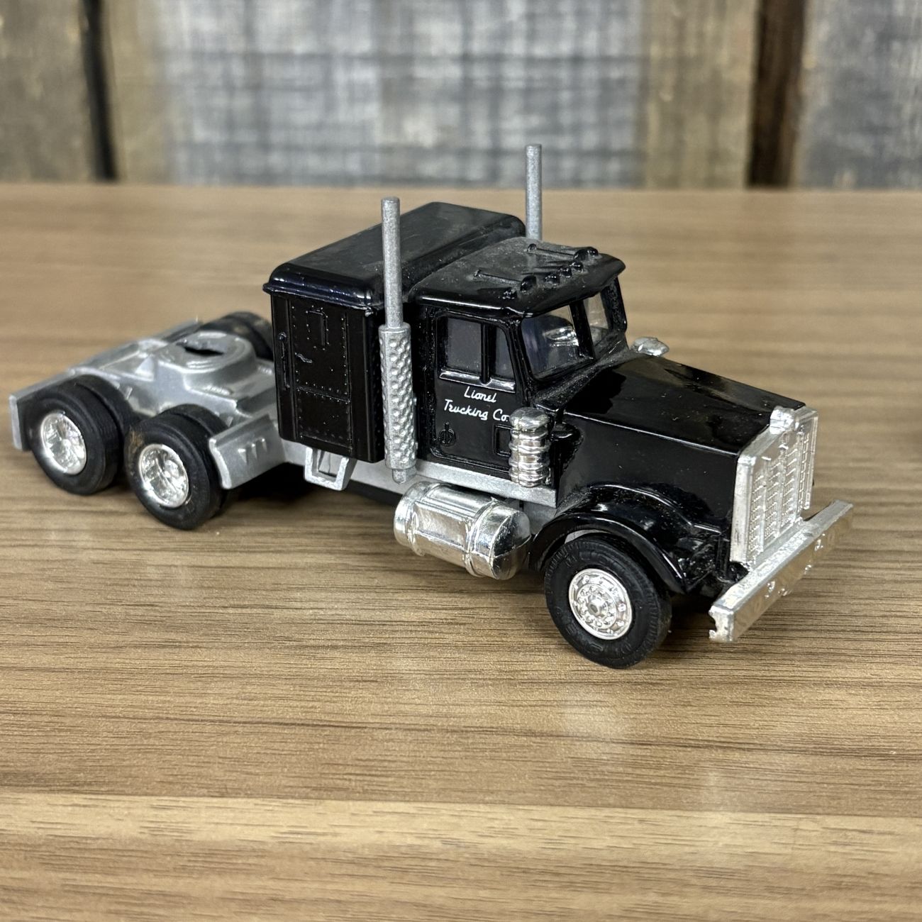 A Collection of Five Vintage Semi-Tractor Cabs and Fire Engine by Lionel, GATA, and Szetoy
