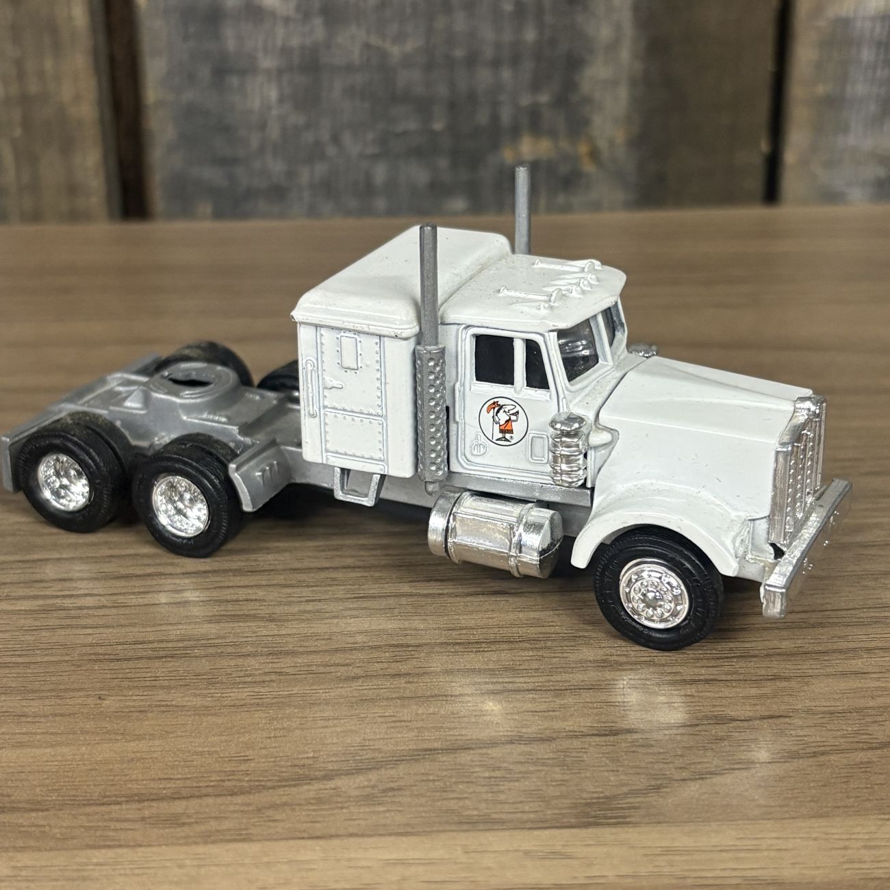 A Collection of Five Vintage Semi-Tractor Cabs and Fire Engine by Lionel, GATA, and Szetoy