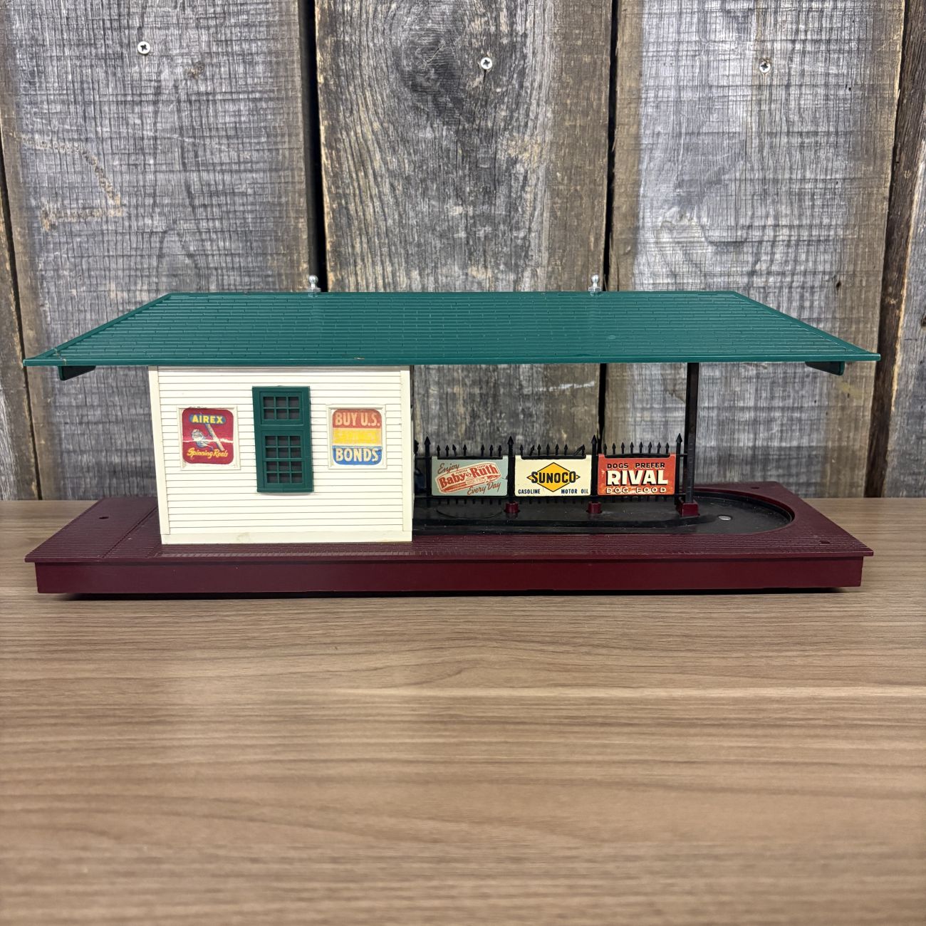 Three Lionel O-Gauge Model Train Station Accessories Including No. 256 Freight Station and No. 156 Station Platforms