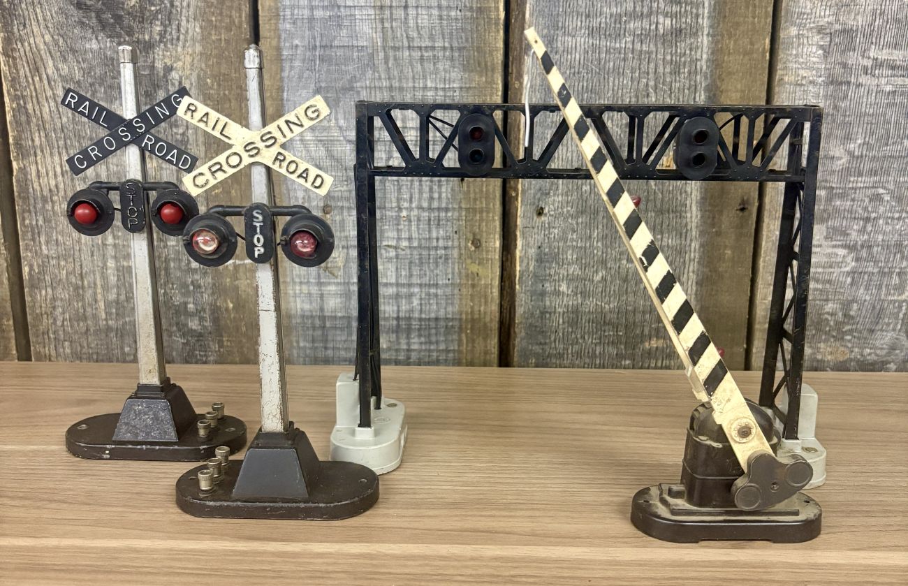 A Group of Vintage Lionel O-Gauge Model Railroad Crossing Accessories