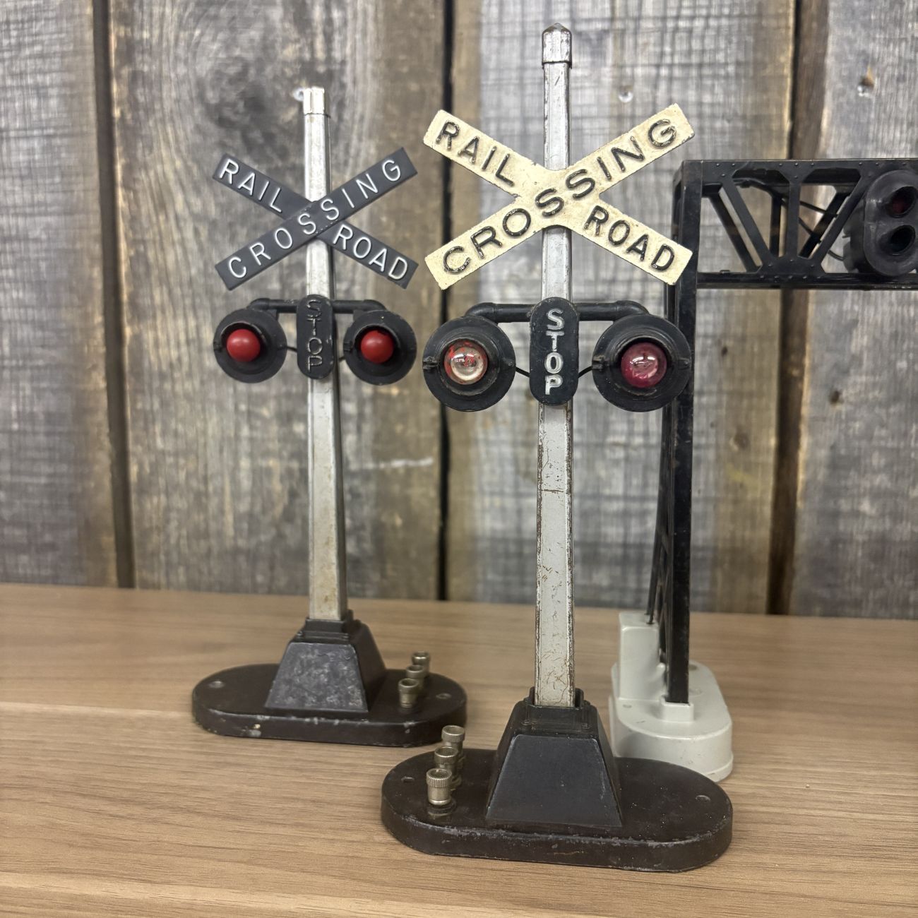 A Group of Vintage Lionel O-Gauge Model Railroad Crossing Accessories