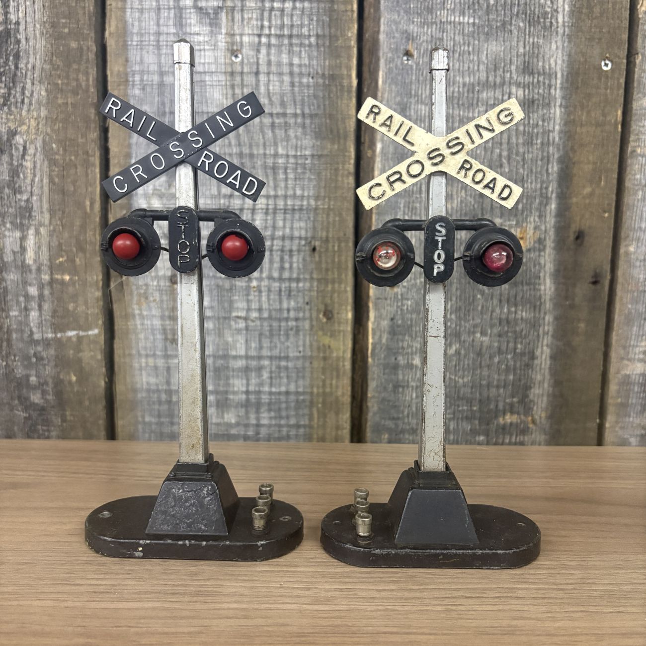 A Group of Vintage Lionel O-Gauge Model Railroad Crossing Accessories