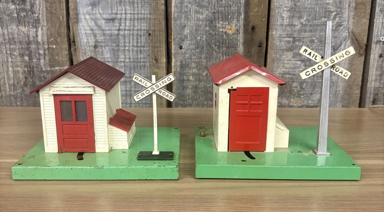 A Pair of Lionel No. 45 and No. 45N Gateman Accessories