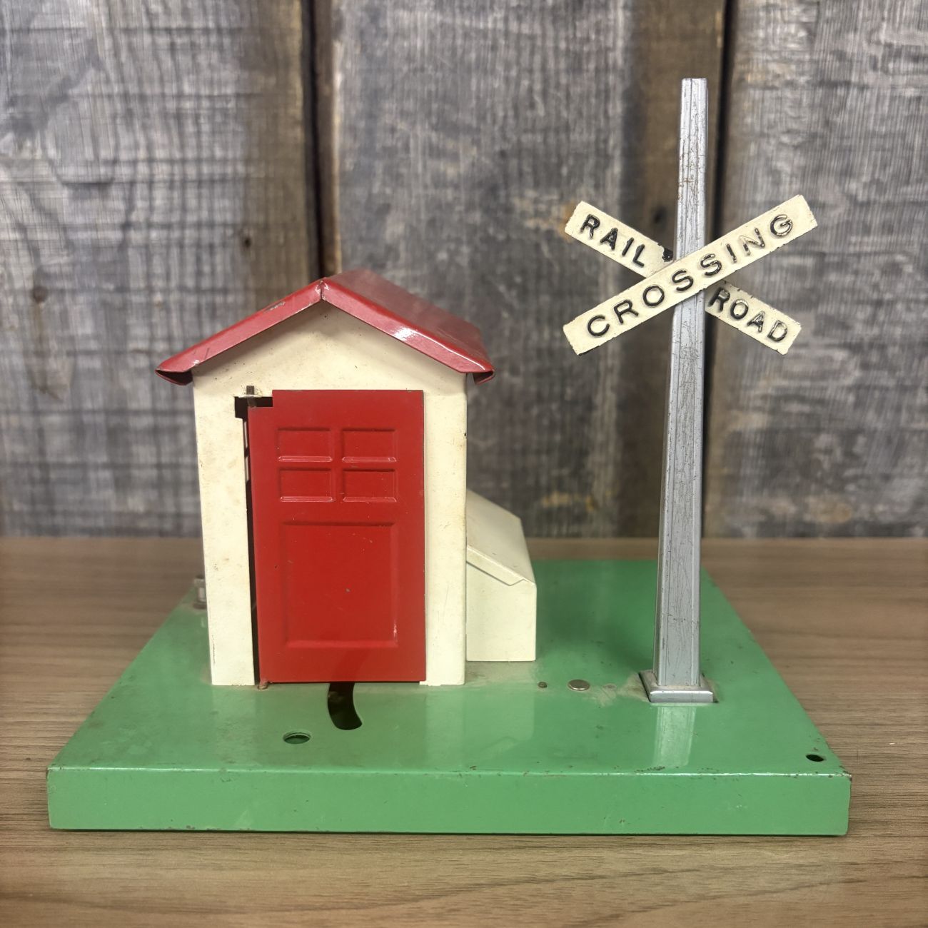 A Pair of Lionel No. 45 and No. 45N Gateman Accessories