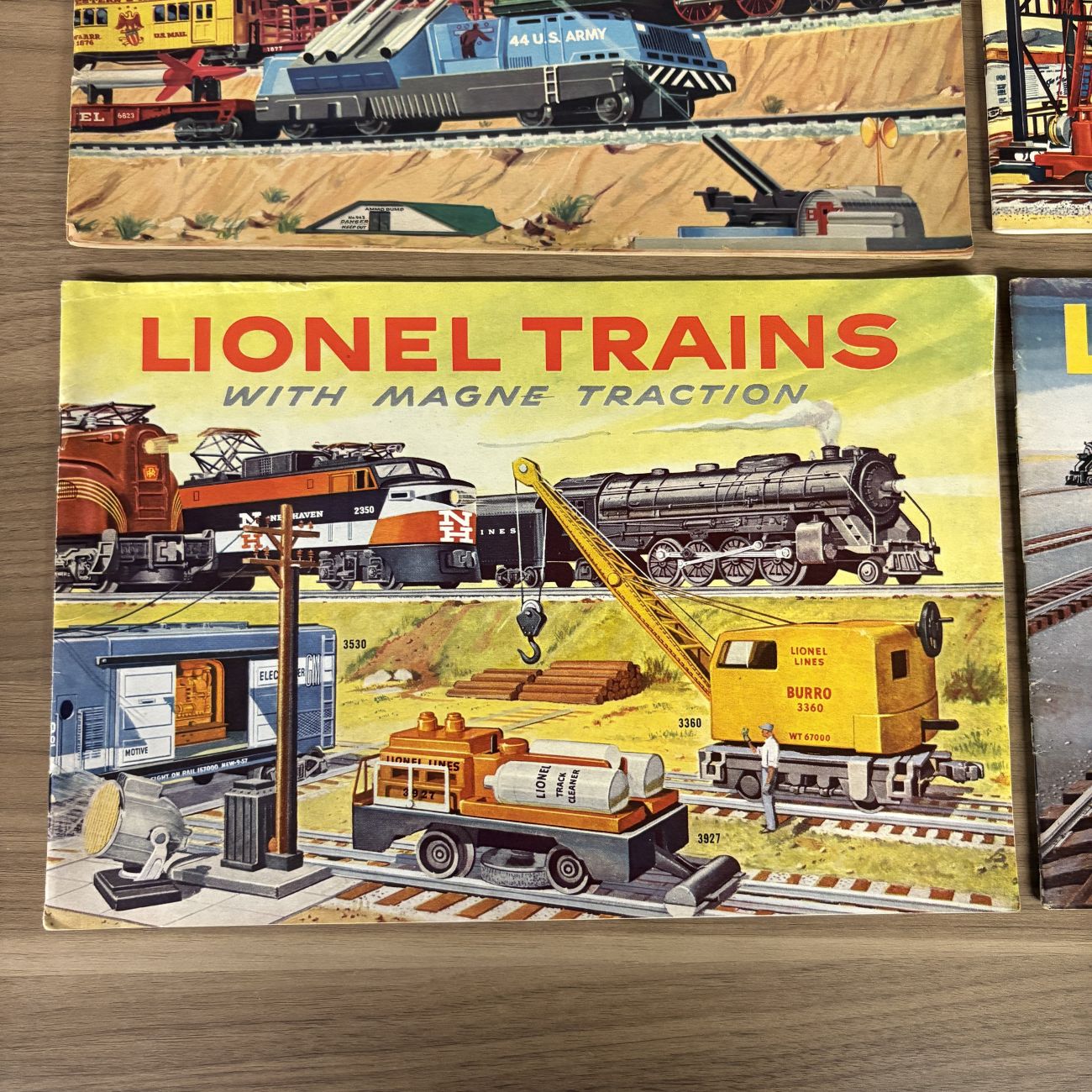 A Collection of Four Vintage Lionel Train Consumer Catalogs, 1956-1959