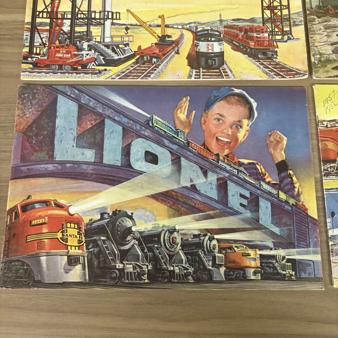 A Collection of Four Vintage Lionel Train Consumer Product Catalogs 1948-1958