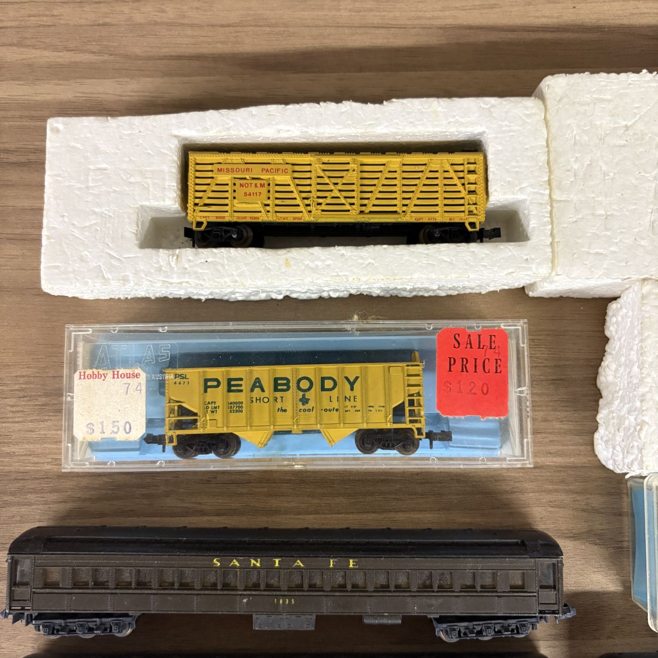 A Collection of Eleven Vintage N-Scale Model Train Locomotives and Rolling Stock Including Lima and Atlas Examples