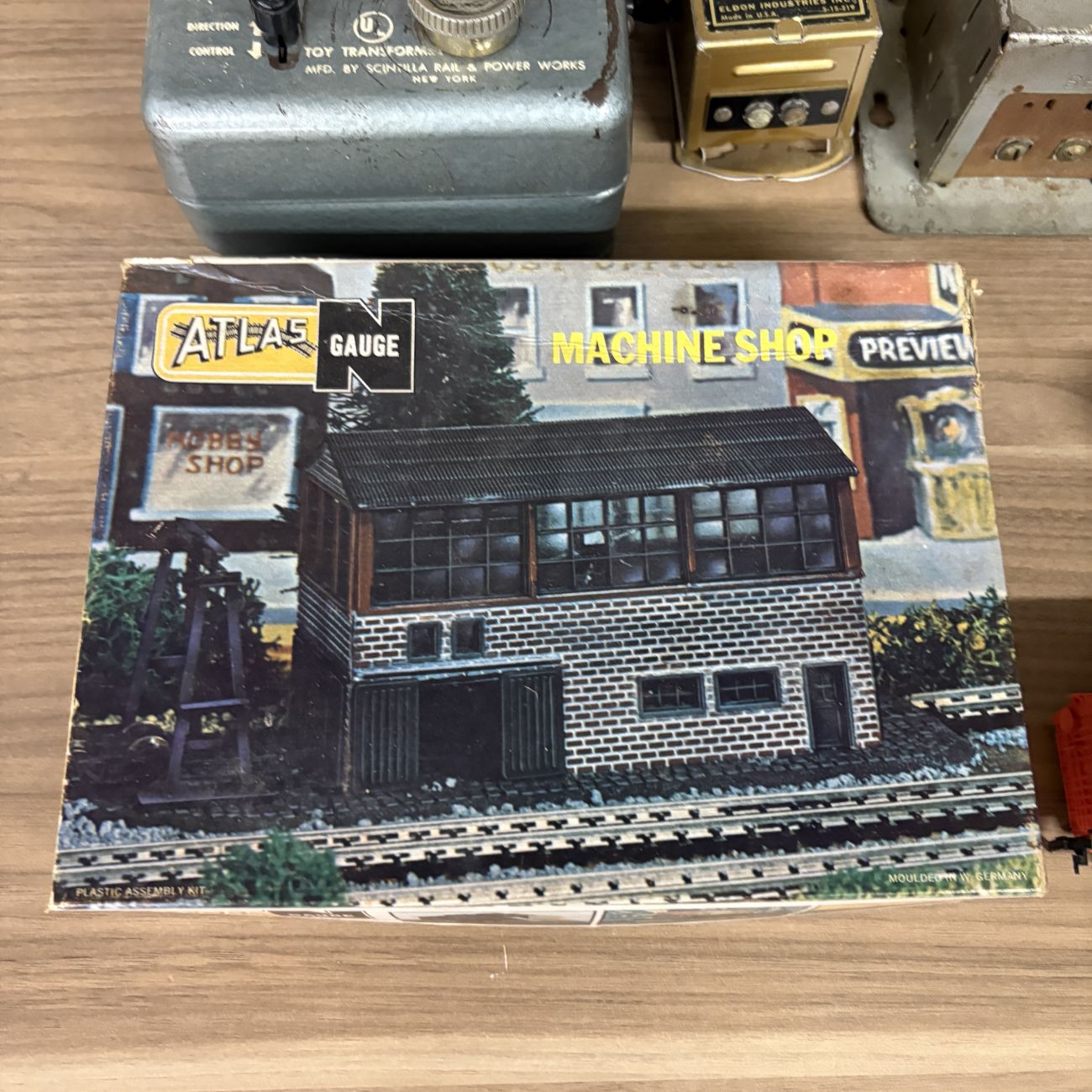 An Assortment of Vintage HO and N Scale Model Train Transformers, Rolling Stock, and Track Accessories