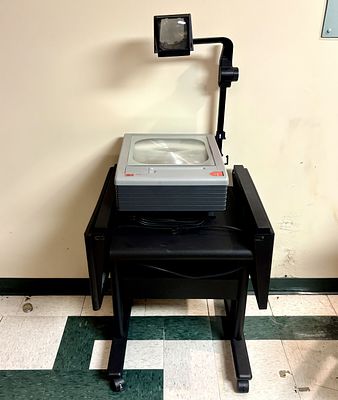 3M 9100 Overhead Projector on Rolling Cart. FOR PICK UP ONLY (Monday 9/28/26 and Tuesday 9/29/26 