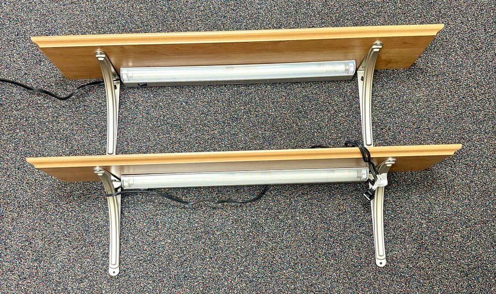 Lot 434: A Pair of Wall-Mounted Wood Laminate Shelves with Integrated Under-Cabinet Lighting
