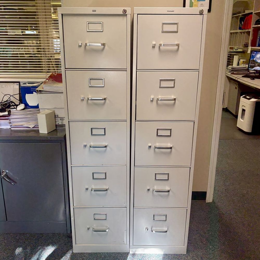 Lot 444: A Pair of HON Five-Drawer Vertical Filing Cabinets