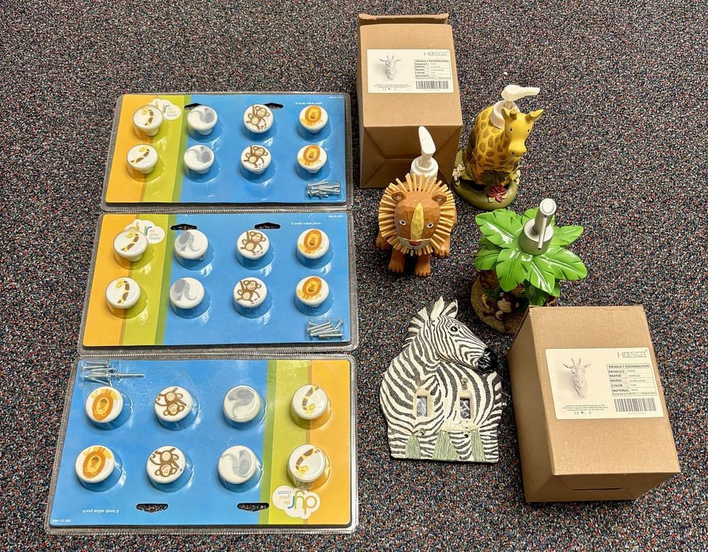 Lot 458: A Collection of Safari Animal Themed Nursery Decor and Hardware Including dyr do your room and