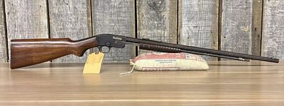 Premier Slide-Action .22 Caliber Octagonal Barrel Rifle. This is a pump-action rimfire rifle 