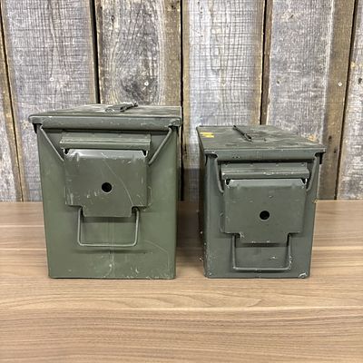 Two US Military Surplus Steel Ammunition Cans. Two steel military-style ammunition cans finished 
