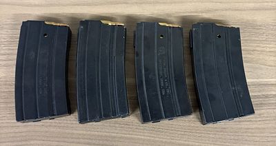 A Collection of Sturm Ruger and Co Inc Mini-14 Steel Magazines with .223 Remington Ammunition. A 