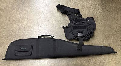 Uncle Mike's Soft Rifle Case and UTG Tactical Shoulder Bag. A pair of black synthetic textile 