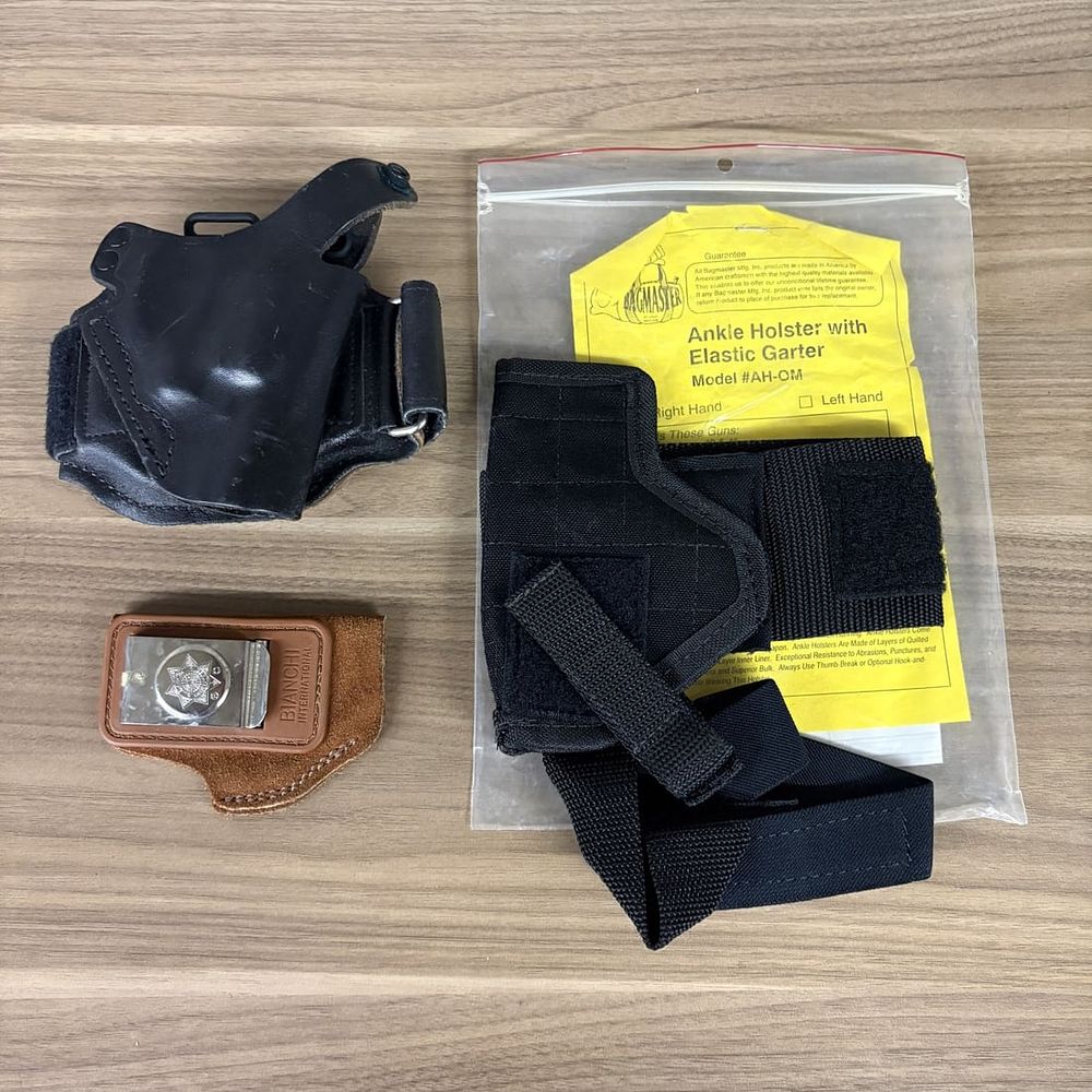 Lot 251: An Assortment of Concealed Carry Handgun Holsters Including Bianchi and Bagmaster