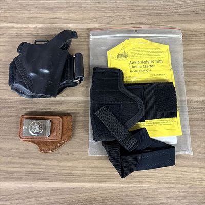 An Assortment of Concealed Carry Handgun Holsters Including Bianchi and Bagmaster. An assortment 