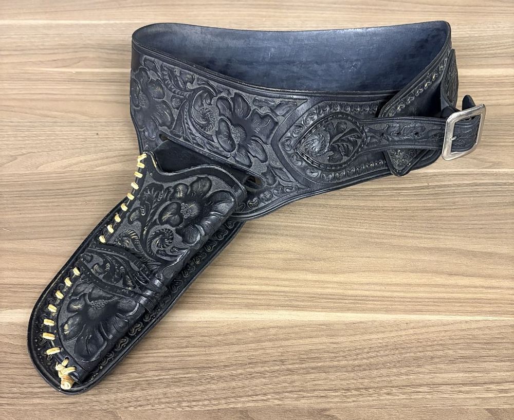 Lot 253: Tooled Black Leather Buscadero Style Gun Belt and Holster Set