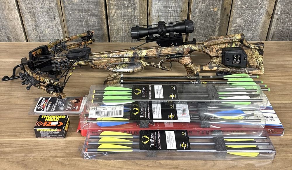 Lot 259: TenPoint Titan Xtreme Compound Crossbow with ACUdraw and Accessories