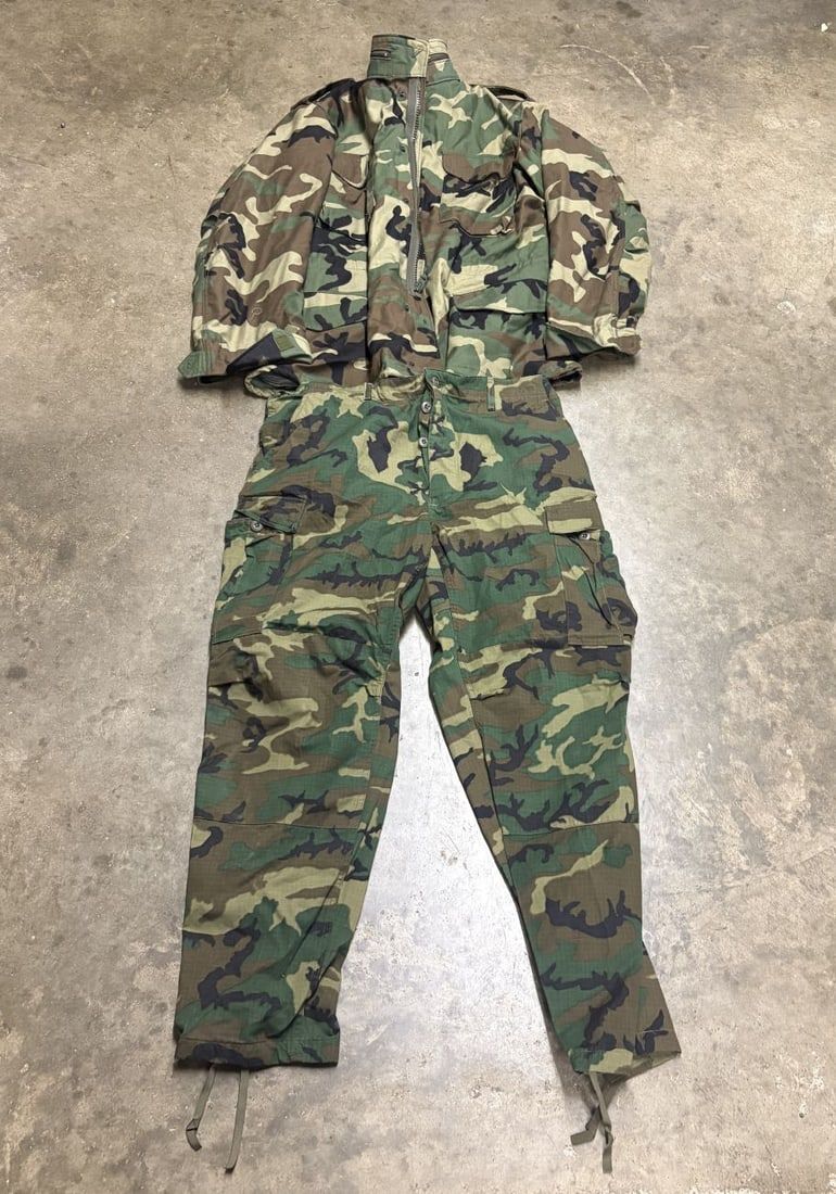 Lot 267: Two Pieces of US Military Woodland Camouflage Cold Weather Clothing Including M-65 Field Coat and