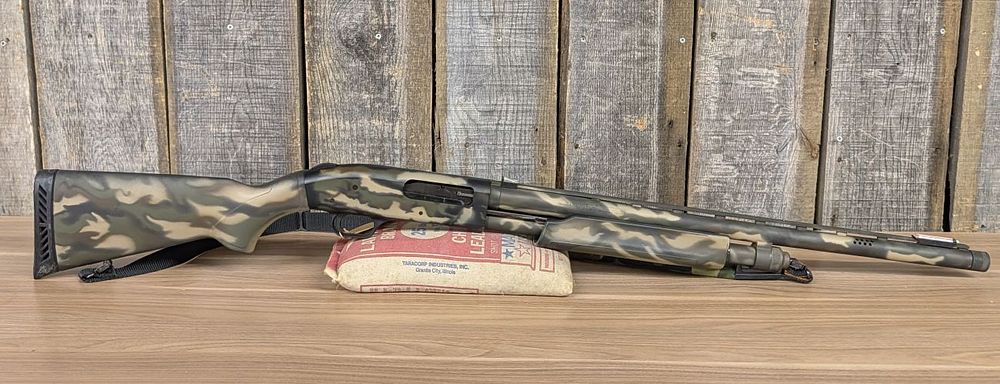 Lot 297: Mossberg Model 835 Ulti-Mag 12-Gauge Pump-Action Shotgun