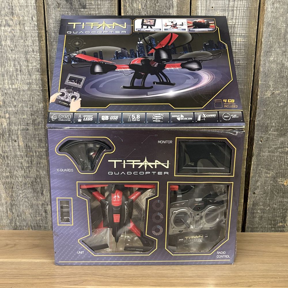 Lot 321: Odyssey Flying Machines Titan Quadcopter with LCD Monitor and Accessories