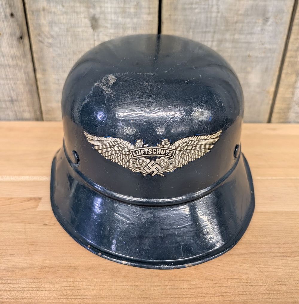 Lot 379: German WWII Luftschutz M40 Gladiator Style Three Piece Steel Helmet