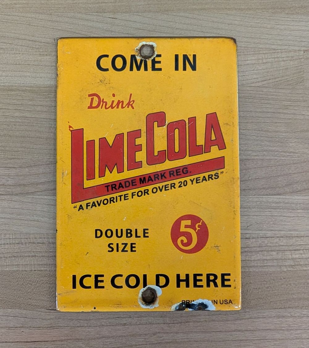 Lot 390: Vintage Lime Cola Porcelain Enamel Soda Advertising Sign