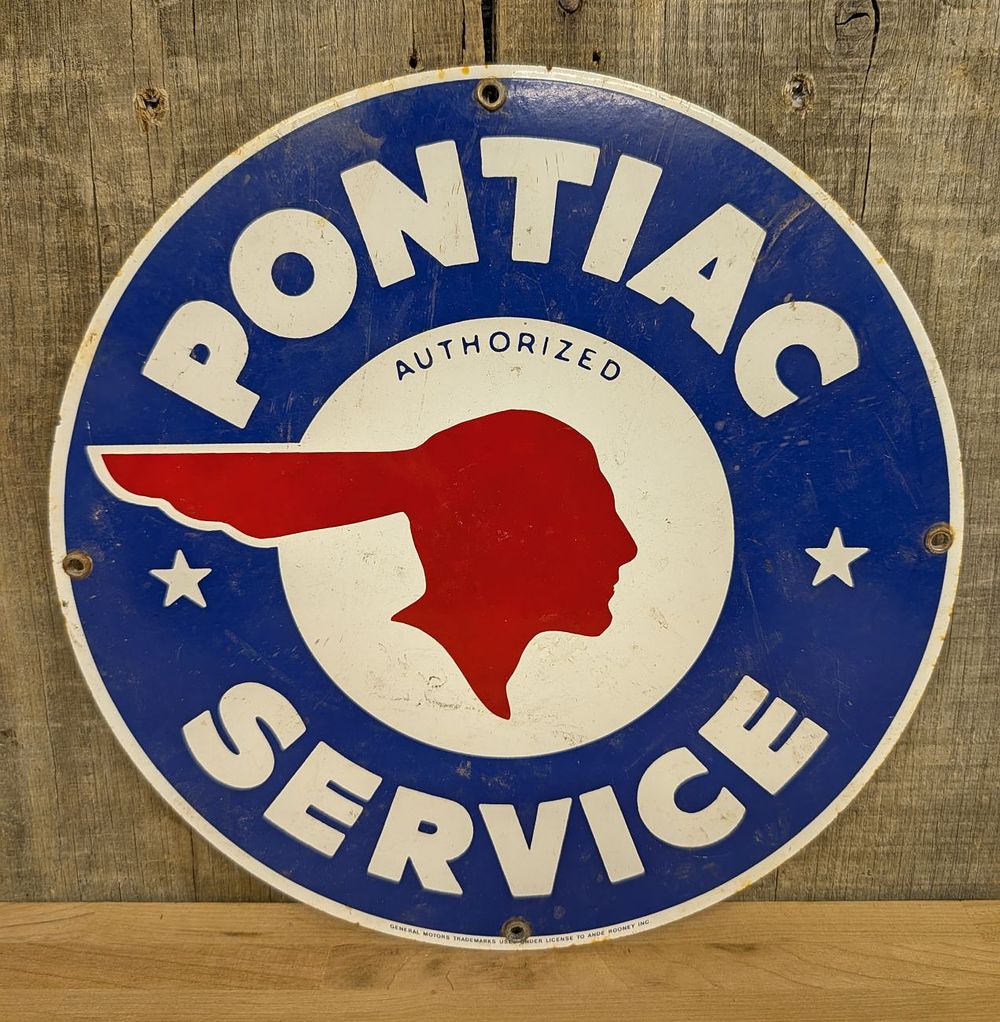 Lot 396: An Ande Rooney Inc. Pontiac Authorized Service Porcelain Enamel Sign