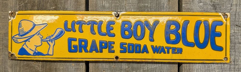 Lot 397: Vintage Little Boy Blue Grape Soda Water Porcelain Enamel Embossed Sign