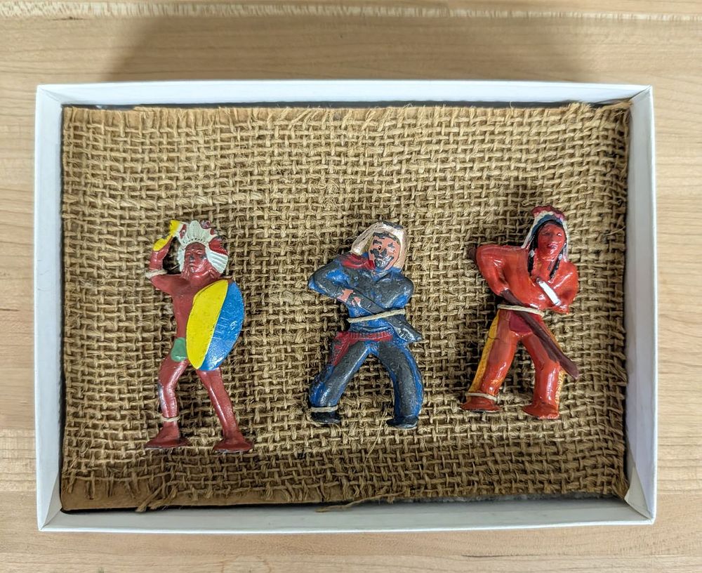 Lot 405: A Trio of Mid-Century Painted Lead Frontier and Indigenous American Figures