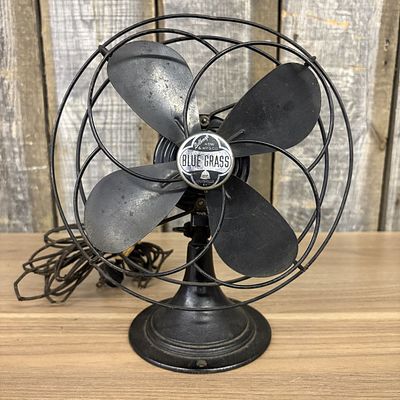 Belknap Blue Grass Electric Desk Fan. A vintage electric desk fan constructed with four 