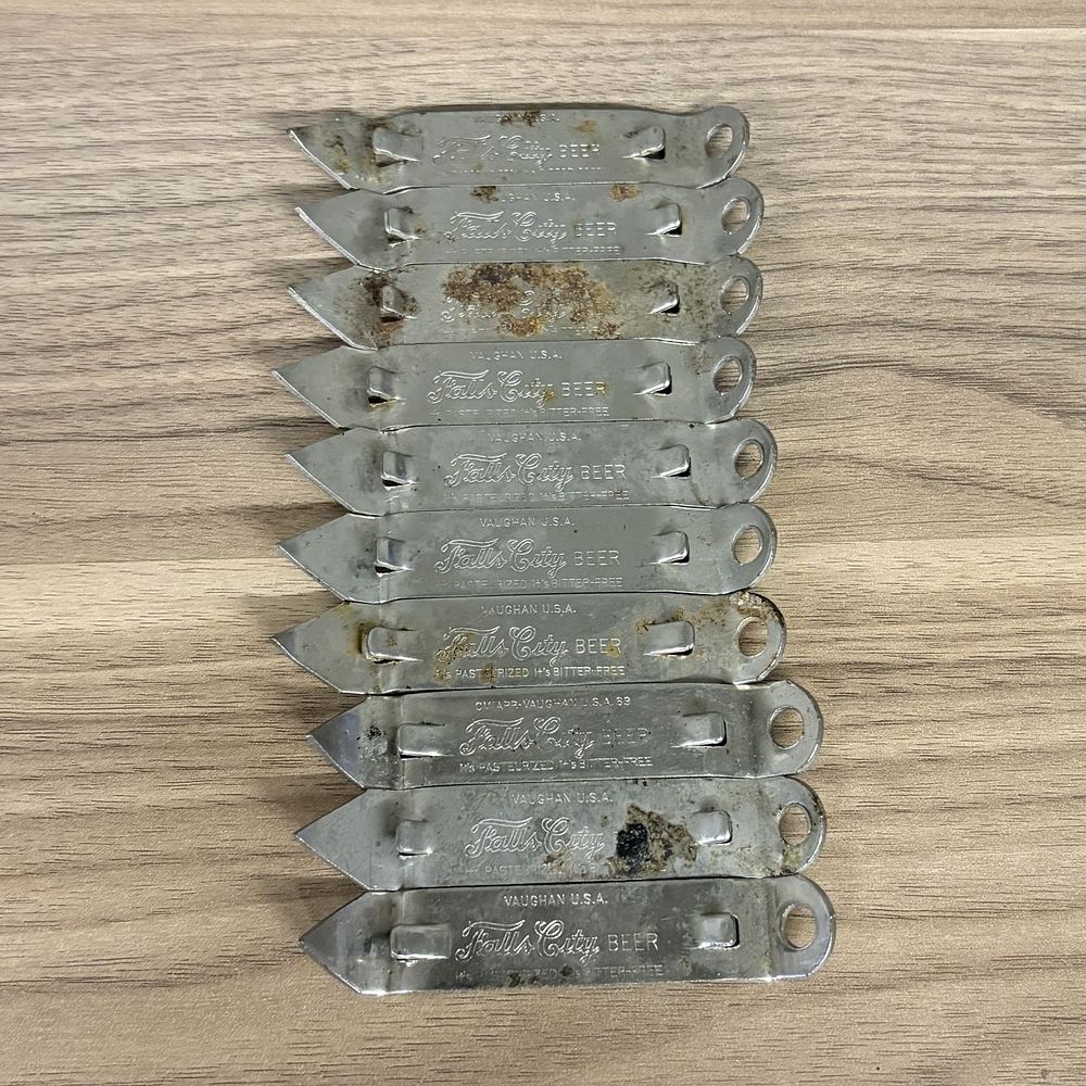 Lot 436: A Collection of Vintage Vaughan Stamped Steel Falls City Beer Church Key Openers