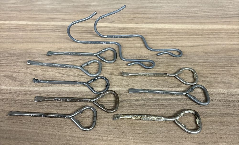 Lot 439: A Collection of Vintage Paint Can and Bottle Openers with Porter Paints Pot Hooks