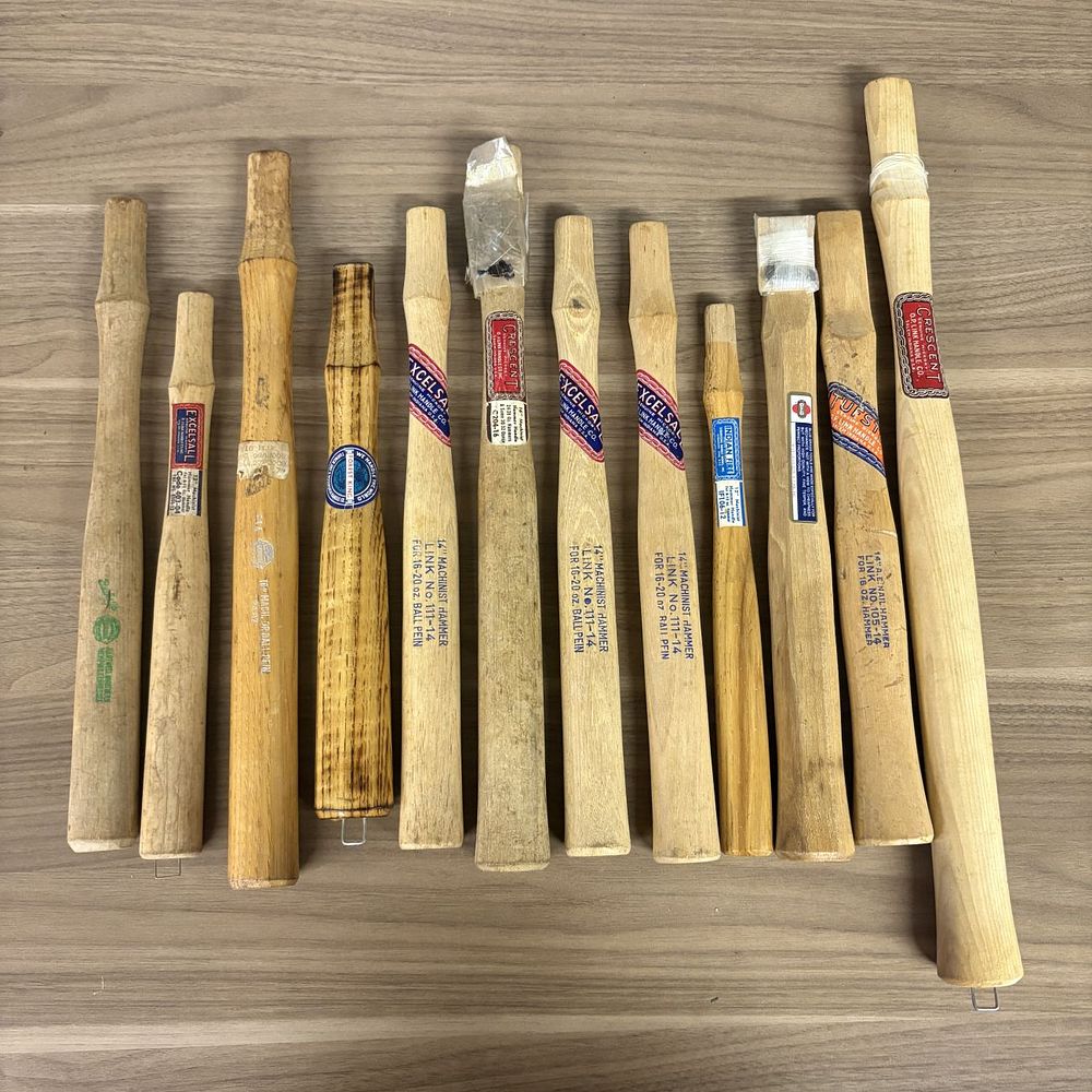Lot 442: A Collection of Vintage American Hickory Replacement Hammer Handles Including Excelsall and Crescent Brands