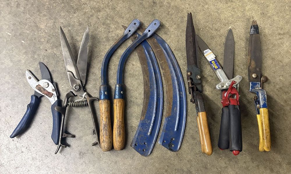 Lot 468: A Collection of Vintage Blue Grass Brand Agricultural and Garden Tools