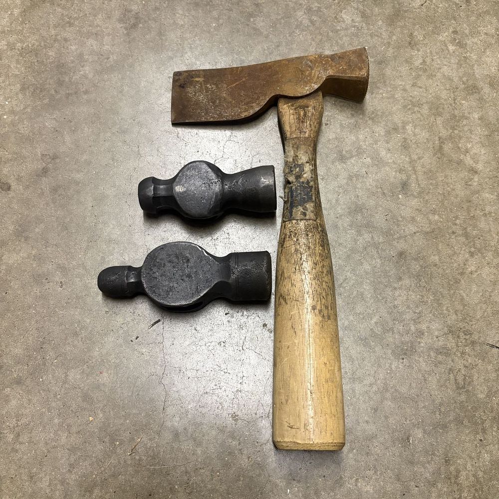 Lot 471: A Group of Forged Steel Tool Heads and a Handled Half Hatchet